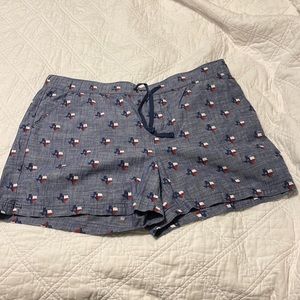 Brand new shorts with the shape of Texas with the flag.